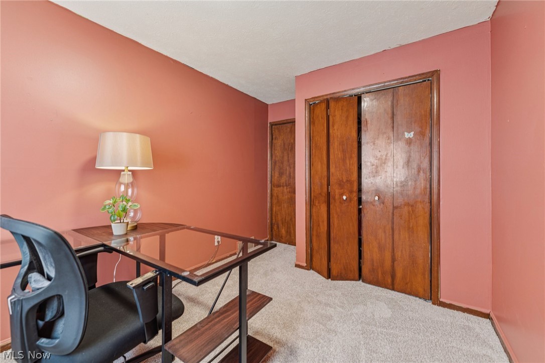 15615 Mason Road Vermilion, OH 44089 - Photo 12 of 34 Office area with light carpet and baseboards