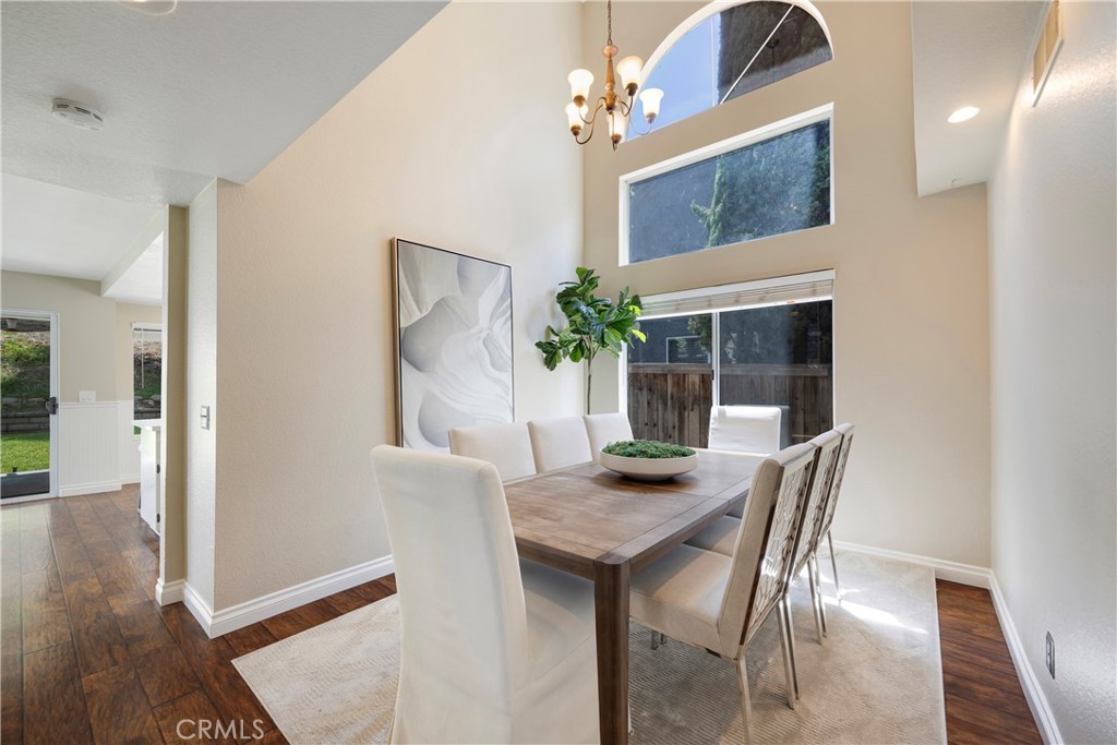 4817 Golden Ridge Drive Corona, CA 92878 - Photo 14 of 70 a dining room with furniture and wooden floor