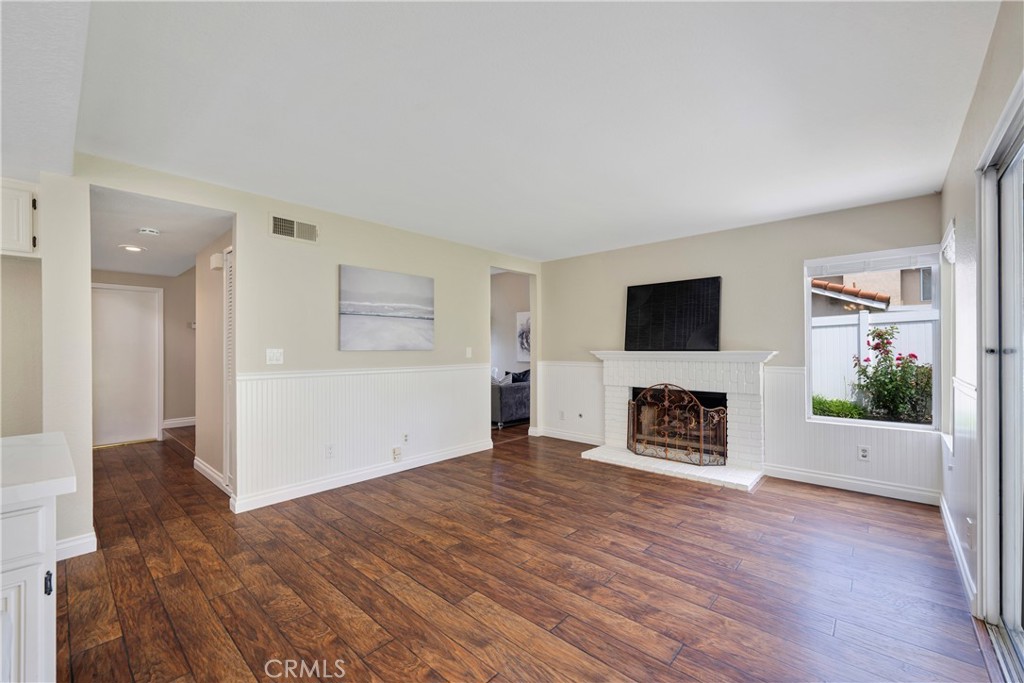 4817 Golden Ridge Drive Corona, CA 92878 - Photo 16 of 70 a view of a livingroom with a fireplace a window and a fireplace