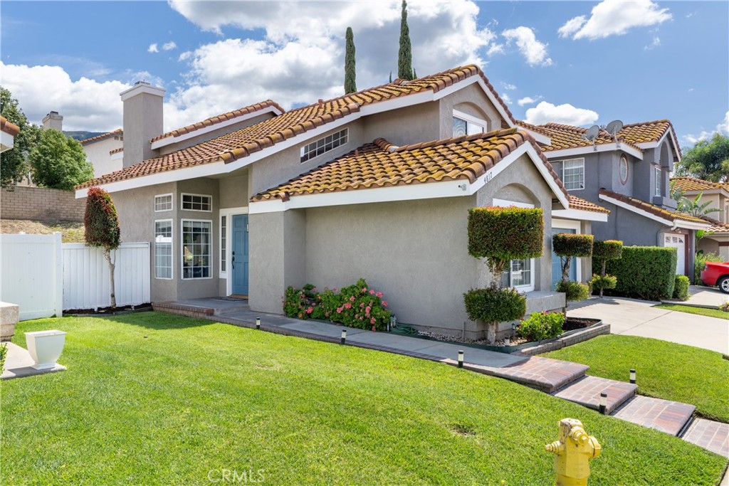 4817 Golden Ridge Drive Corona, CA 92878 - Photo 2 of 70 a front view of house with yard