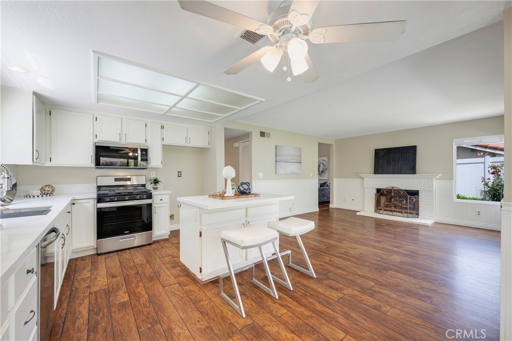 4817 Golden Ridge Drive Corona, CA 92878 - Photo 21 of 70 Open concept kitchen/family room has openings to living room & dining room.