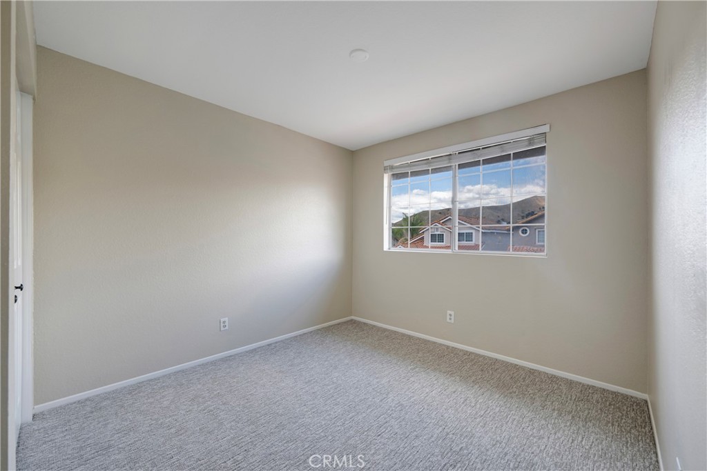 4817 Golden Ridge Drive Corona, CA 92878 - Photo 33 of 70 an empty room with a window