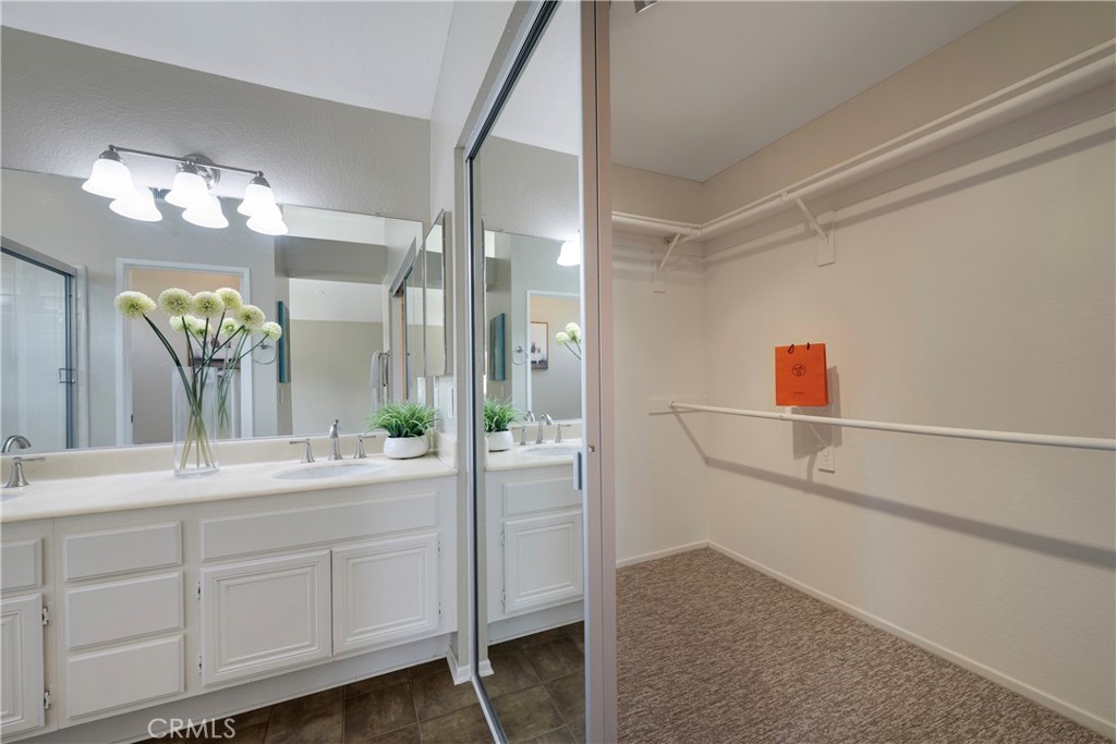 4817 Golden Ridge Drive Corona, CA 92878 - Photo 44 of 70 Sliding glass doors on walk in closet in primary bathroom.