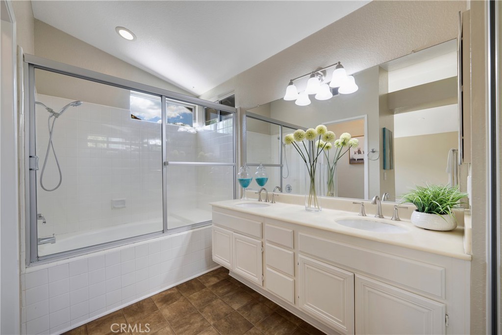 4817 Golden Ridge Drive Corona, CA 92878 - Photo 47 of 70 a bathroom with a double vanity sink mirror and shower