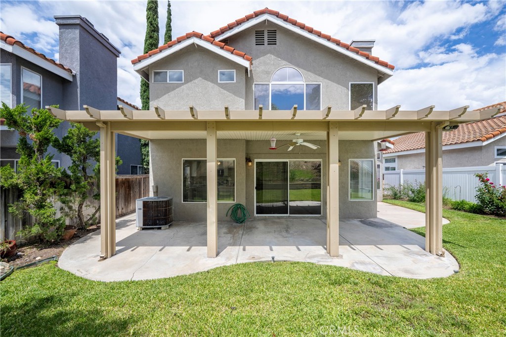 4817 Golden Ridge Drive Corona, CA 92878 - Photo 49 of 70 a front view of a house with a yard and porch