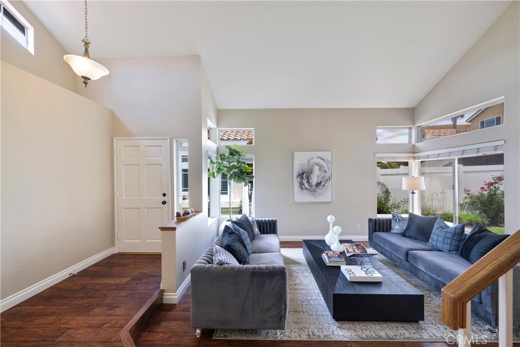 4817 Golden Ridge Drive Corona, CA 92878 - Photo 5 of 70 a living room with furniture and a wooden floor