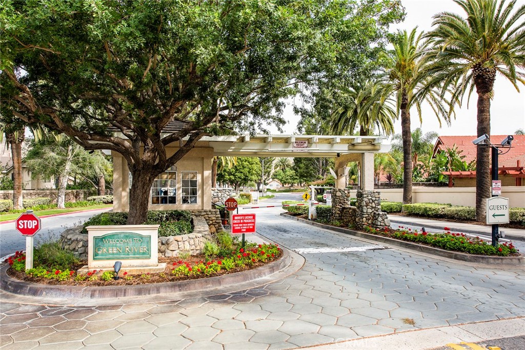 4817 Golden Ridge Drive Corona, CA 92878 - Photo 56 of 70 a front view of a house with fountain and garden