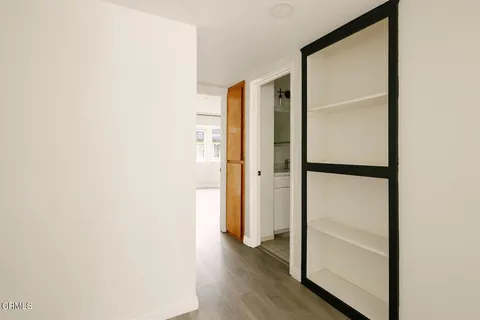 a view of front door with wooden floor
