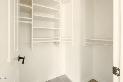 a view of a room with rack on the wall