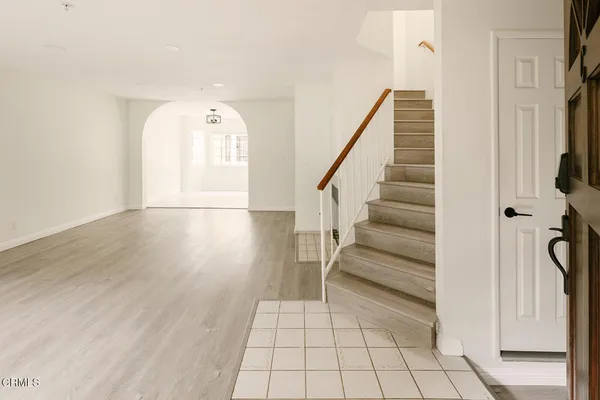 a view of entryway with wooden floor