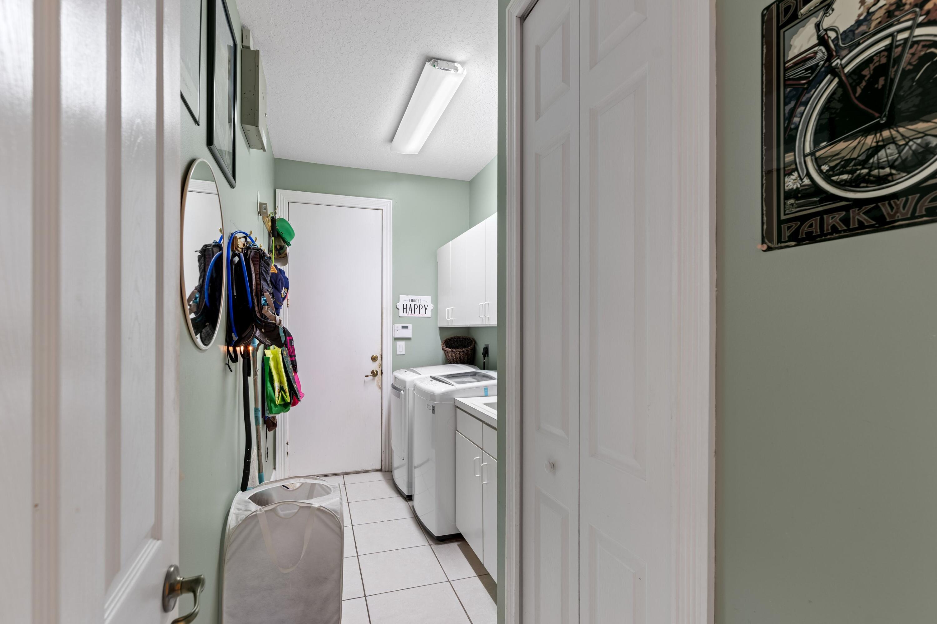 21334 Falls Ridge Way Boca Raton, FL 33428 - Photo 21 of 22 a view of a hallway and a livingroom with furniture