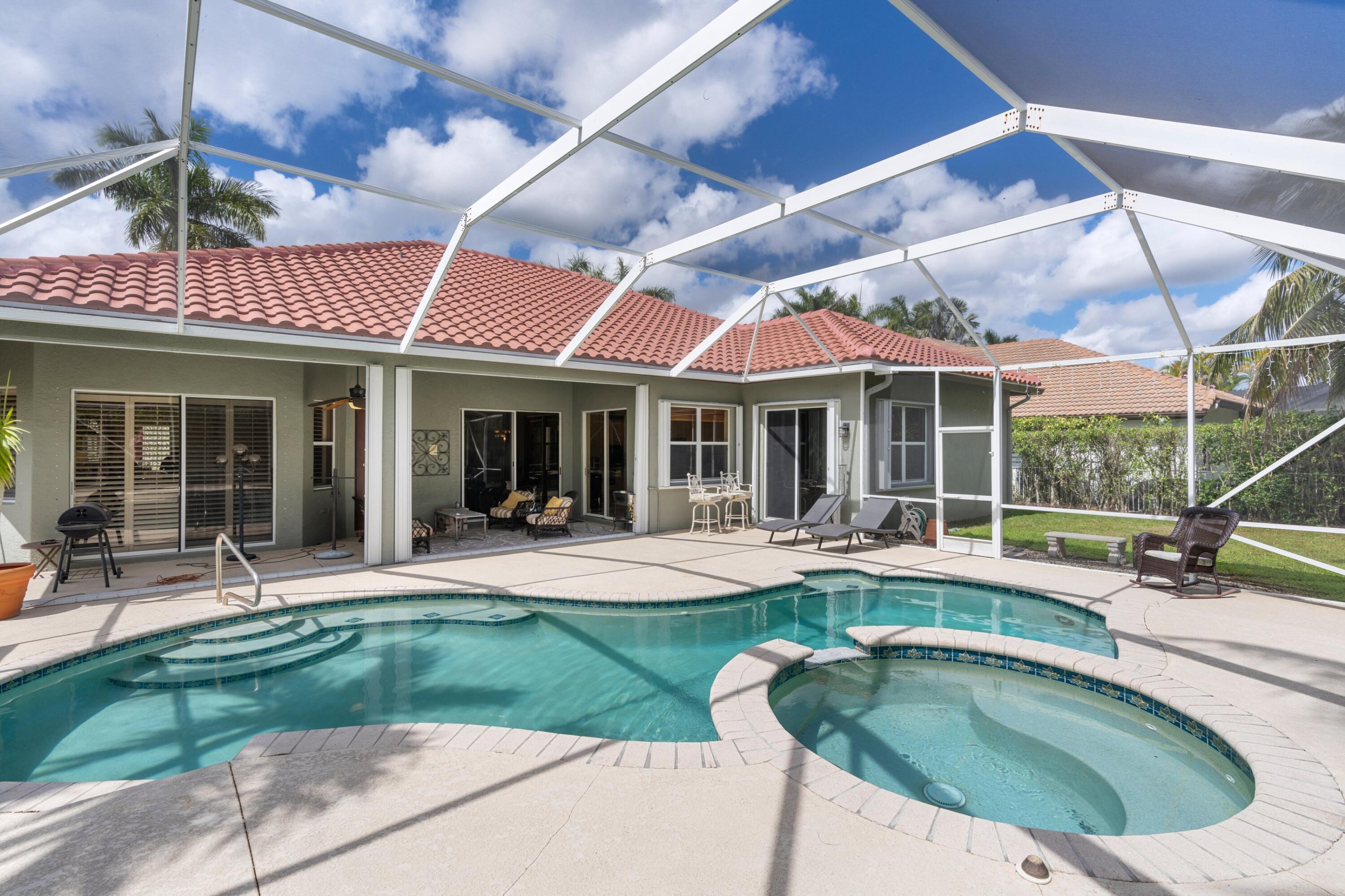 21334 Falls Ridge Way Boca Raton, FL 33428 - Photo 4 of 22 a view of a house with a backyard porch and sitting area