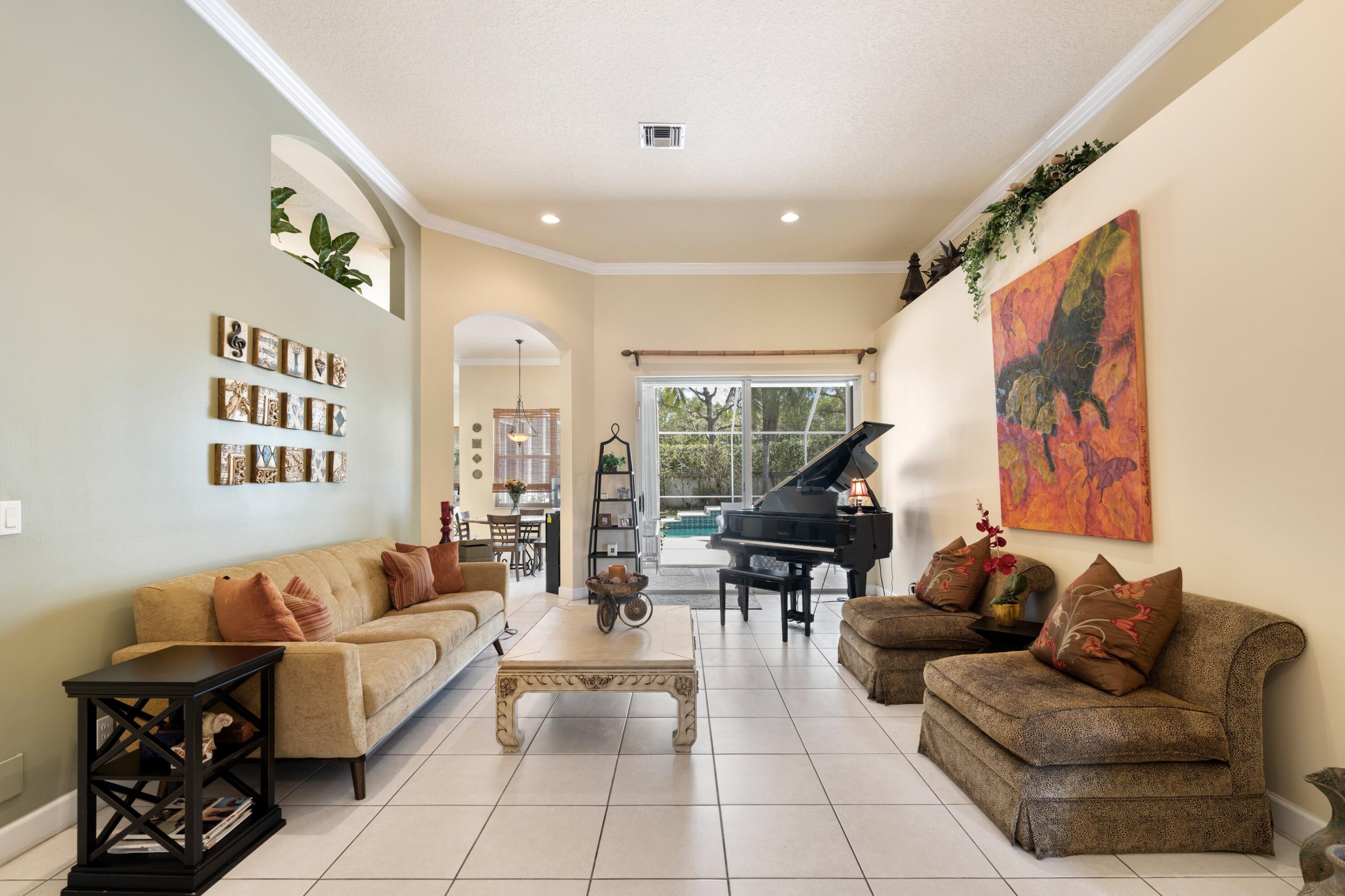 21334 Falls Ridge Way Boca Raton, FL 33428 - Photo 7 of 22 a living room with furniture and wooden floor