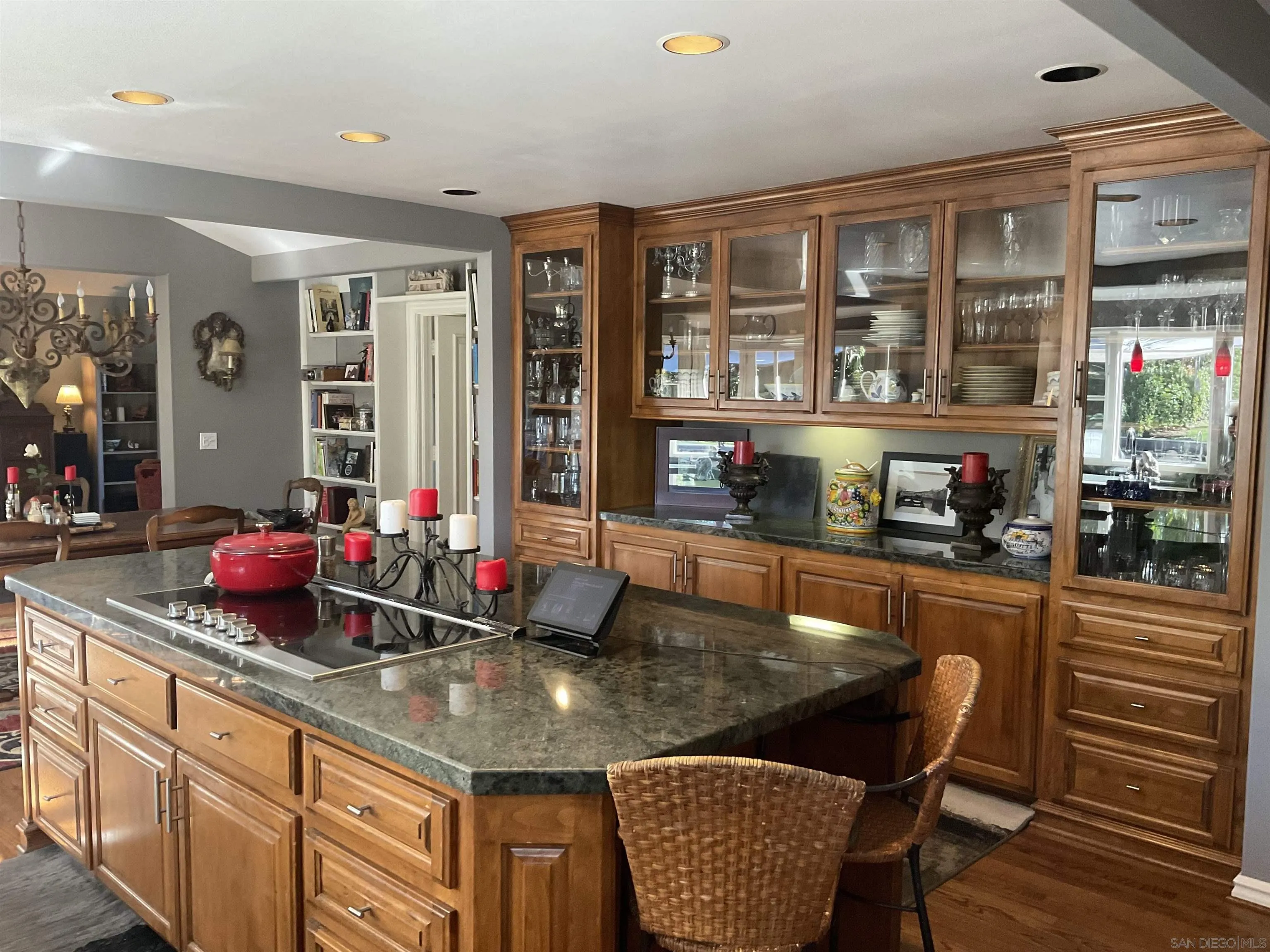 17532 Los Eucaliptos Rancho Santa Fe, CA 92067 - Photo 12 of 39 a kitchen with stainless steel appliances granite countertop a sink and cabinets
