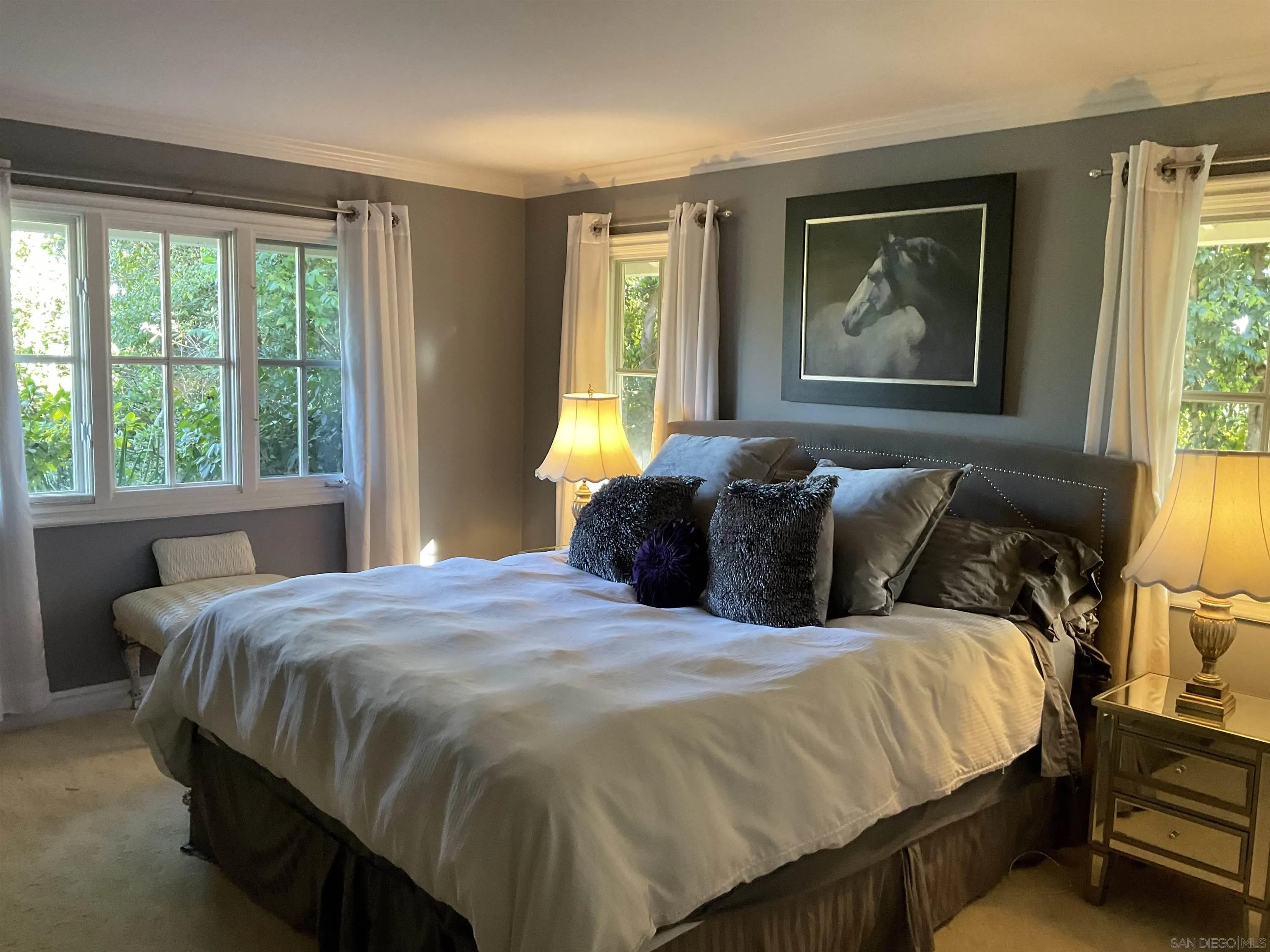17532 Los Eucaliptos Rancho Santa Fe, CA 92067 - Photo 23 of 39 a bedroom with a bed and wooden floor