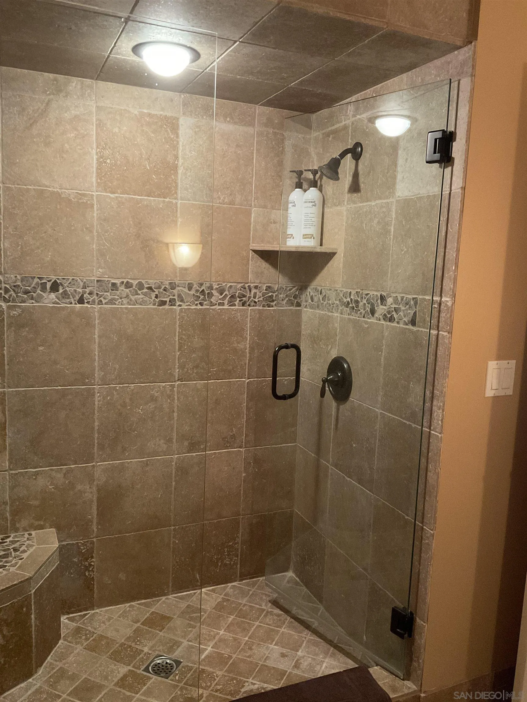 17532 Los Eucaliptos Rancho Santa Fe, CA 92067 - Photo 26 of 39 a bathroom with a shower