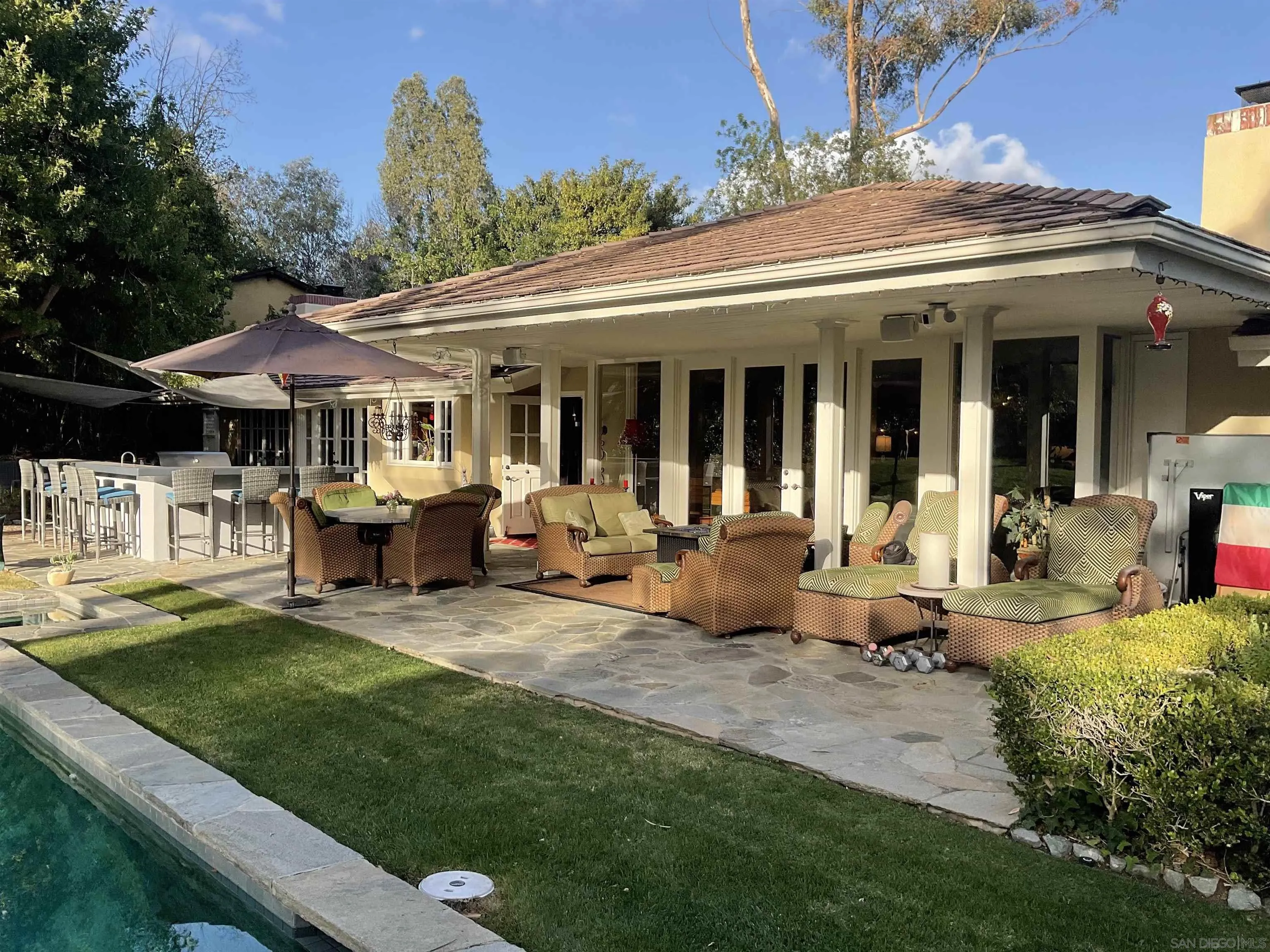 17532 Los Eucaliptos Rancho Santa Fe, CA 92067 - Photo 31 of 39 a view of a house with backyard porch and sitting area