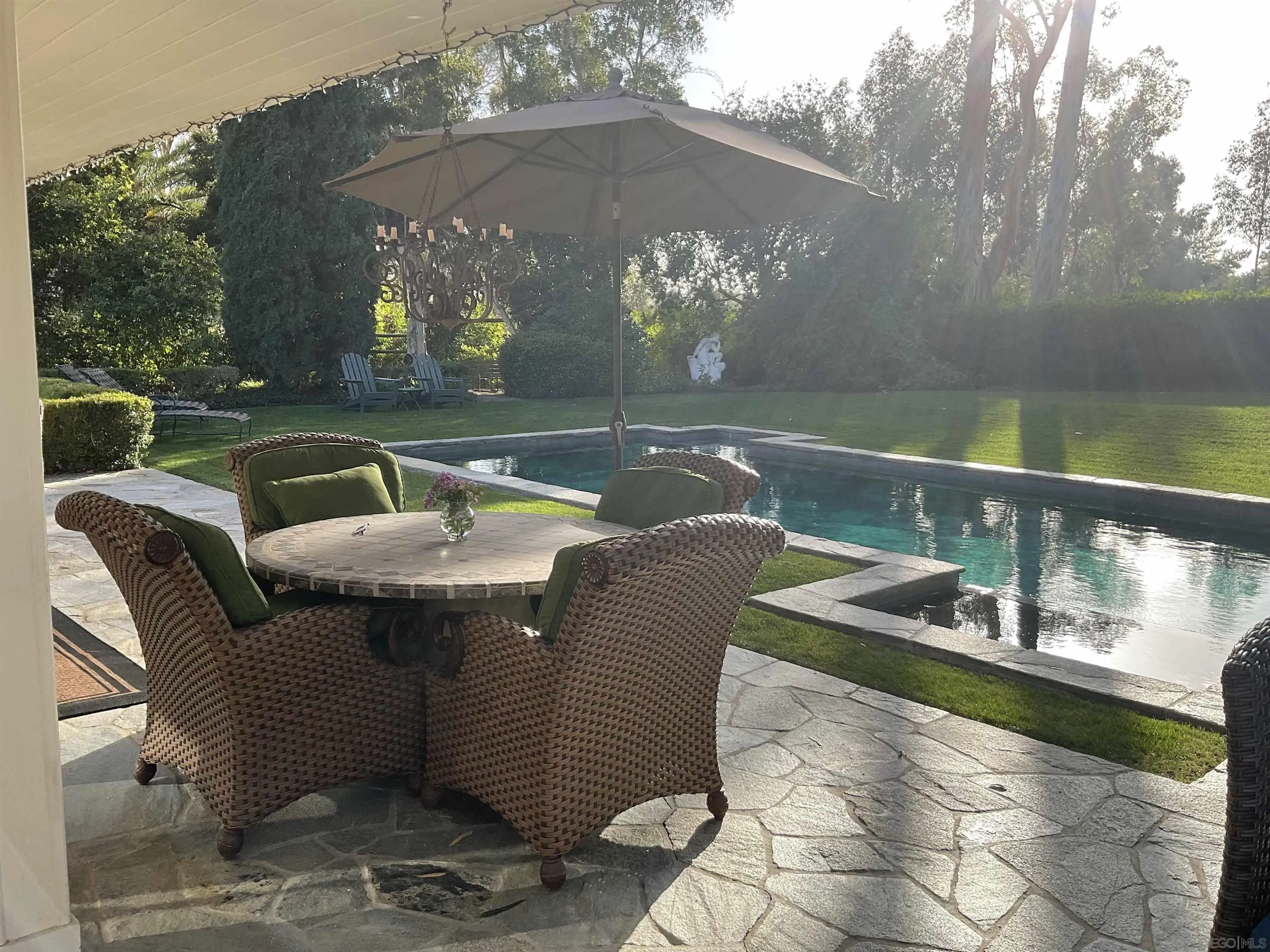 17532 Los Eucaliptos Rancho Santa Fe, CA 92067 - Photo 36 of 39 a view of a chairs and table in patio