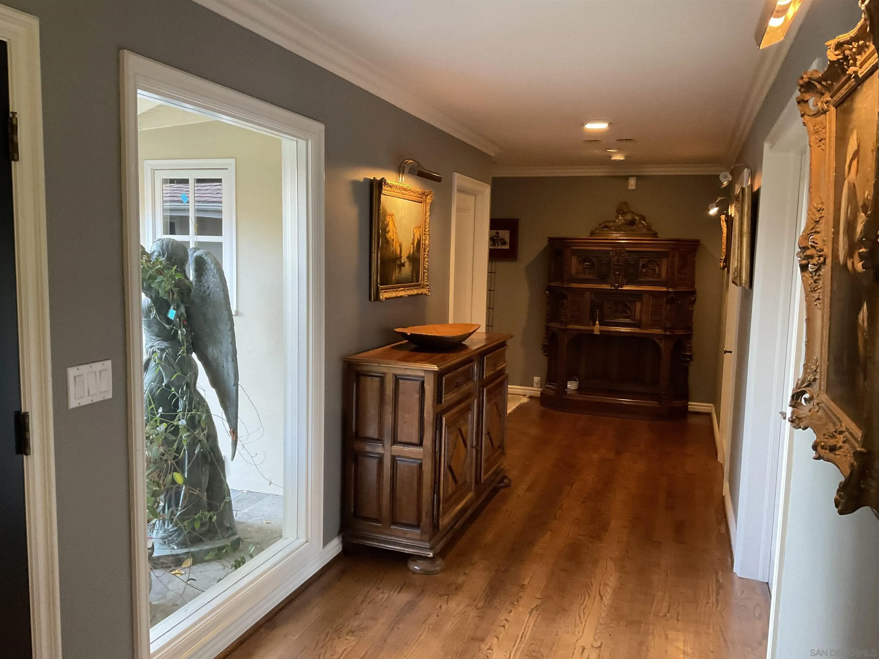 17532 Los Eucaliptos Rancho Santa Fe, CA 92067 - Photo 4 of 39 a view of an entryway with wooden floor