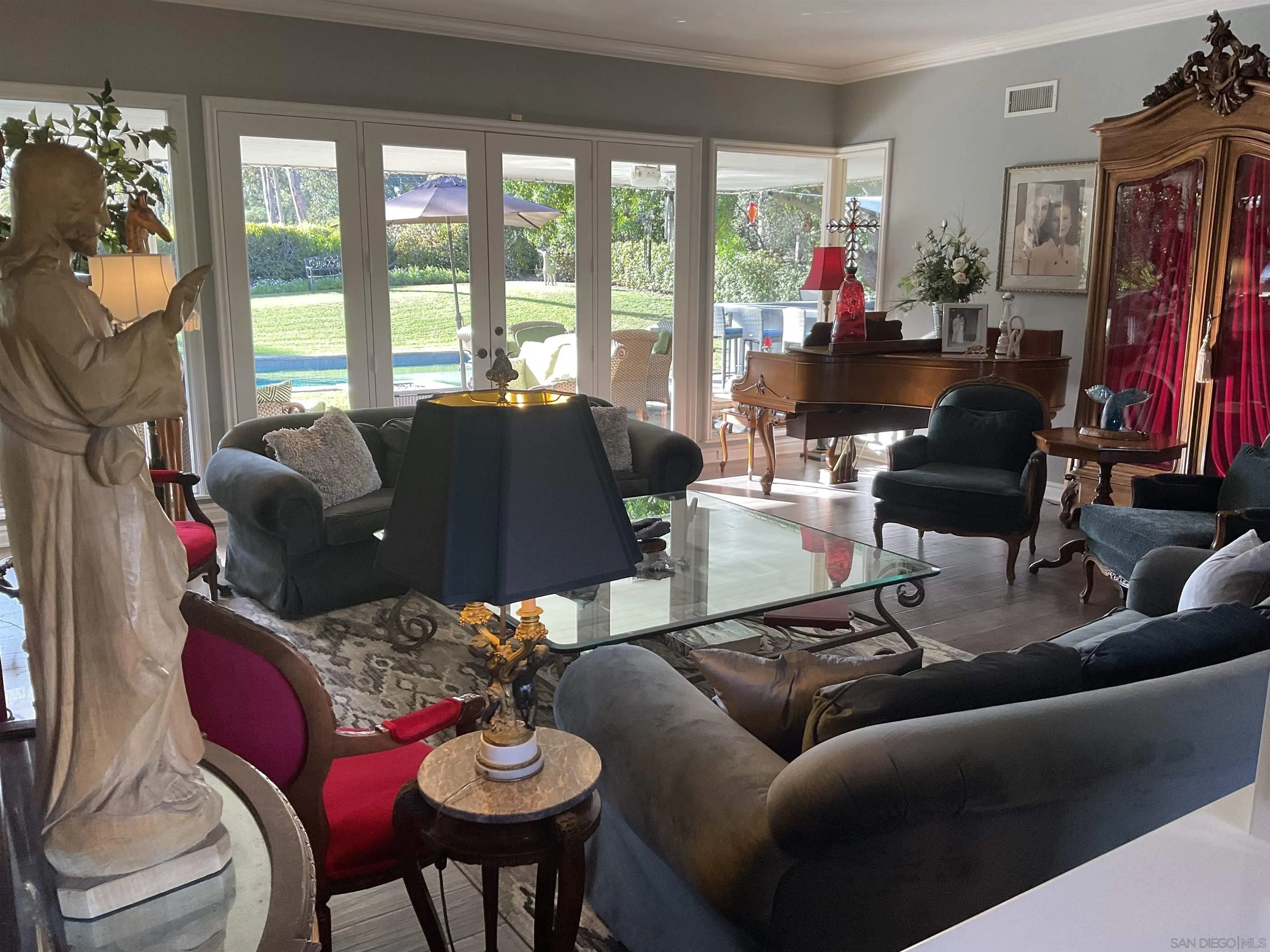 17532 Los Eucaliptos Rancho Santa Fe, CA 92067 - Photo 5 of 39 a living room with furniture and a large window