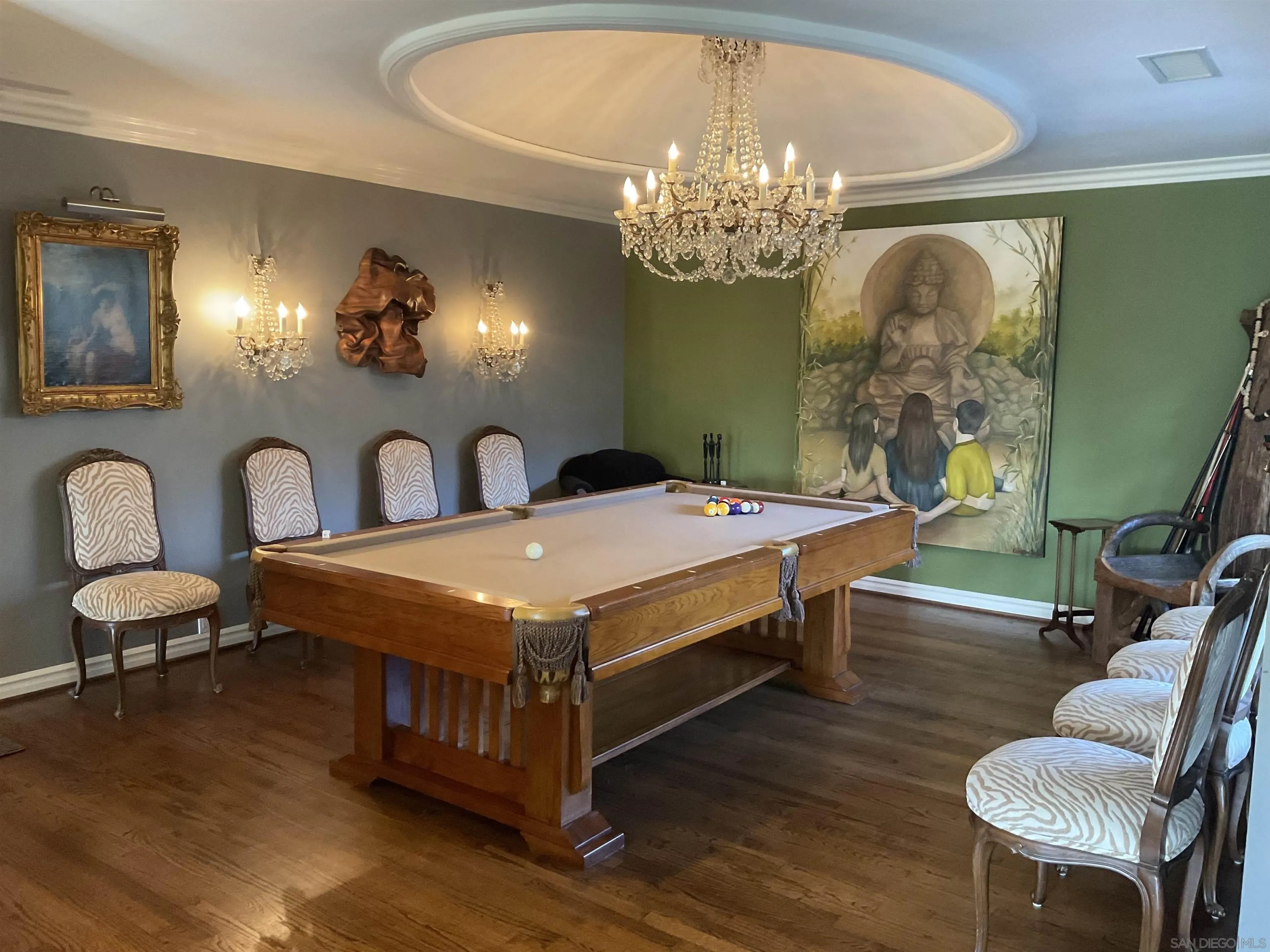 17532 Los Eucaliptos Rancho Santa Fe, CA 92067 - Photo 10 of 39 a bedroom with a bed mirror and furniture