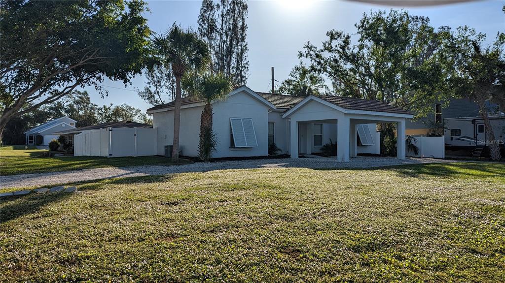 3101 Fallow Road Venice, FL 34293 - Photo 3 of 18 a house view with a garden space