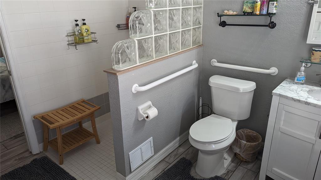 3101 Fallow Road Venice, FL 34293 - Photo 5 of 18 a bathroom with a toilet and a shower