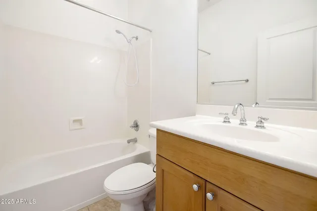 a view of a patio with couches table and chairs and potted plants