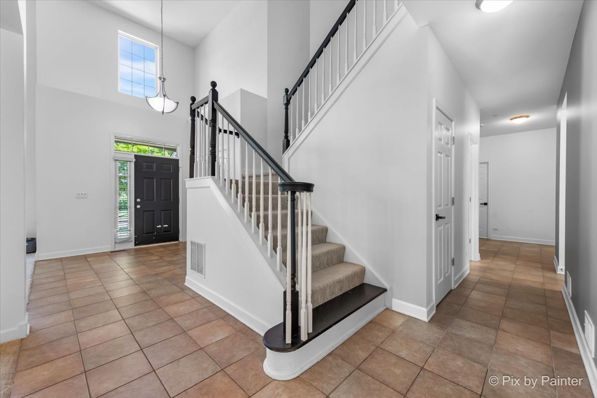 5919 Chatham Drive Hoffman Estates, IL 60192 - Photo 11 of 52 a view of a hallway view with staircase