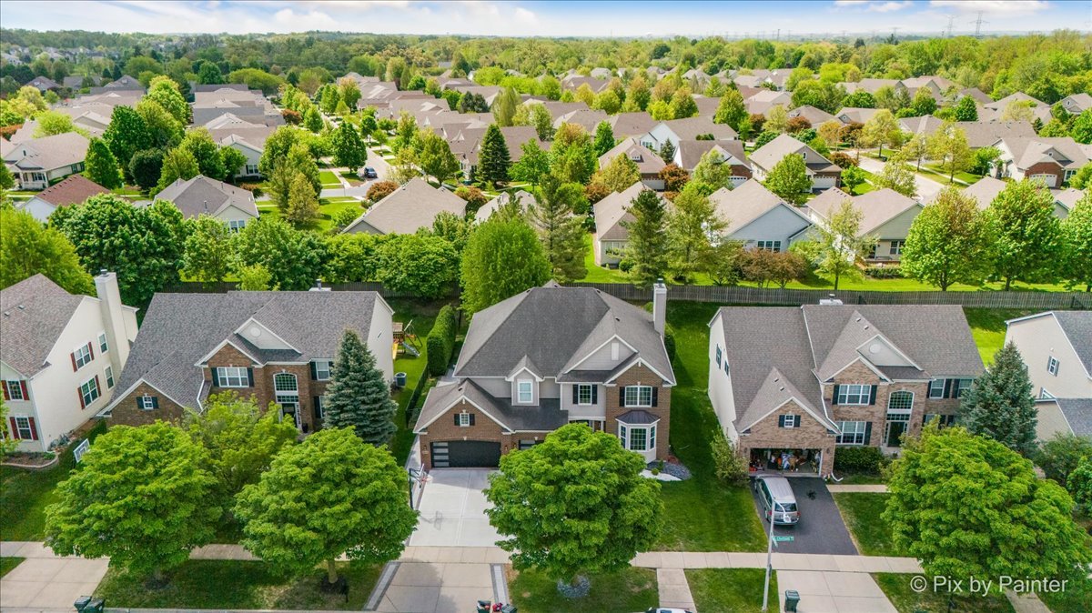 5919 Chatham Drive Hoffman Estates, IL 60192 - Photo 40 of 52 an aerial view of a house with a garden