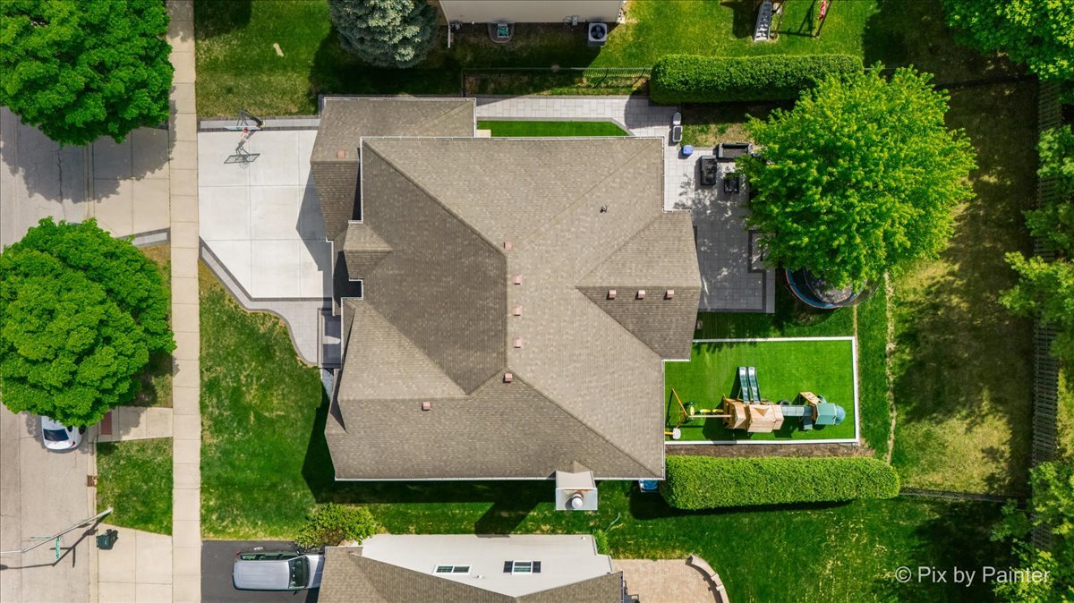 5919 Chatham Drive Hoffman Estates, IL 60192 - Photo 43 of 52 an aerial view of a house with a yard