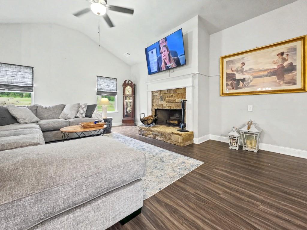 453 Mulberry Rock Road Temple, GA 30179 - Photo 13 of 35 a living room with furniture and a fireplace