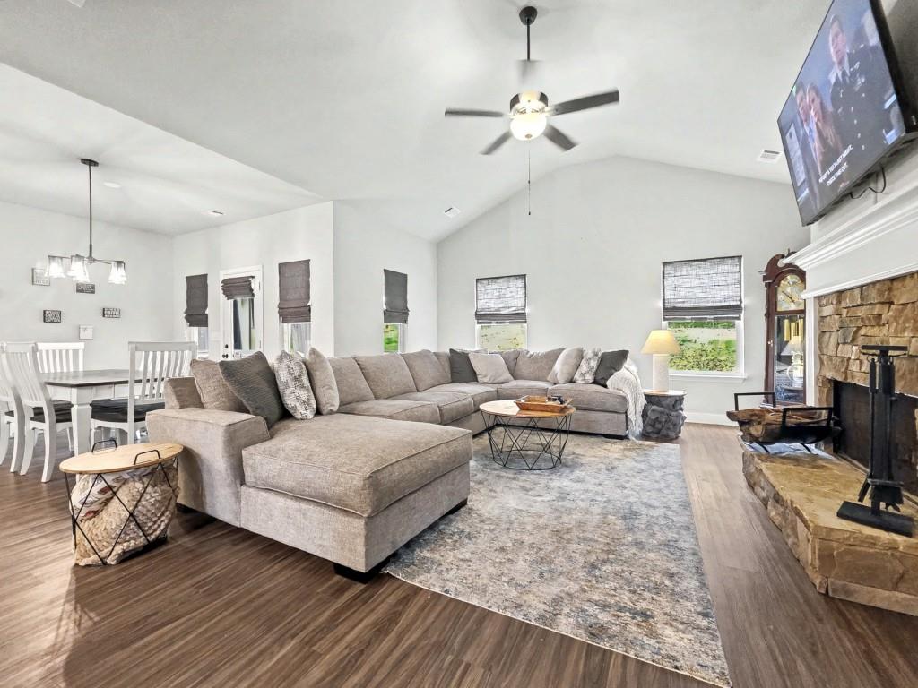 453 Mulberry Rock Road Temple, GA 30179 - Photo 14 of 35 a living room with furniture and a chandelier
