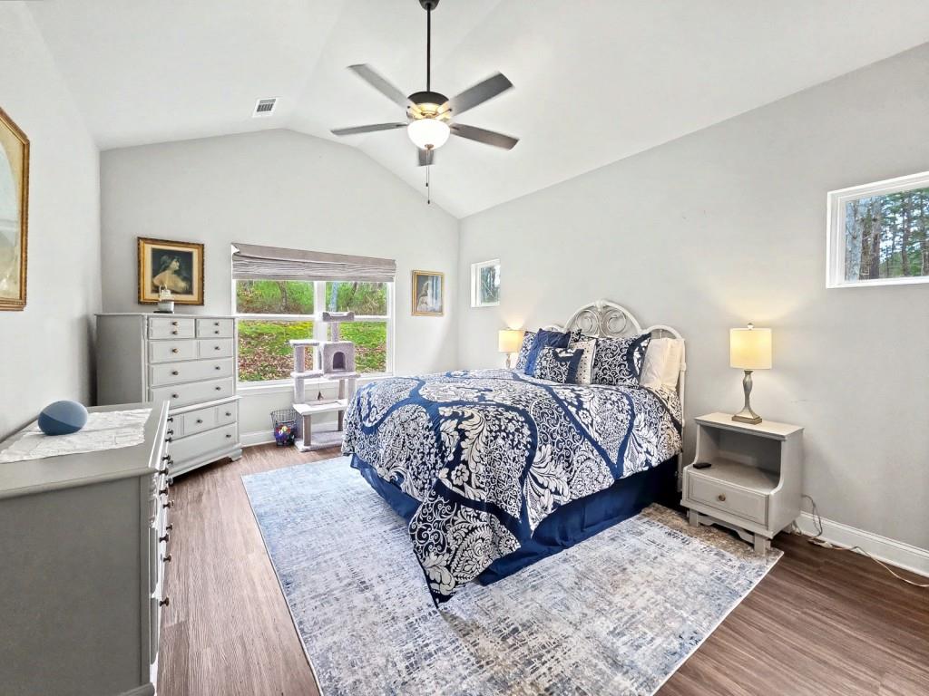 453 Mulberry Rock Road Temple, GA 30179 - Photo 15 of 35 a bedroom with a large bed and a window