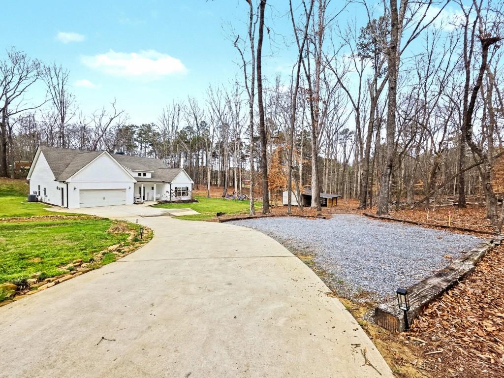 453 Mulberry Rock Road Temple, GA 30179 - Photo 2 of 35 a view of road with large trees