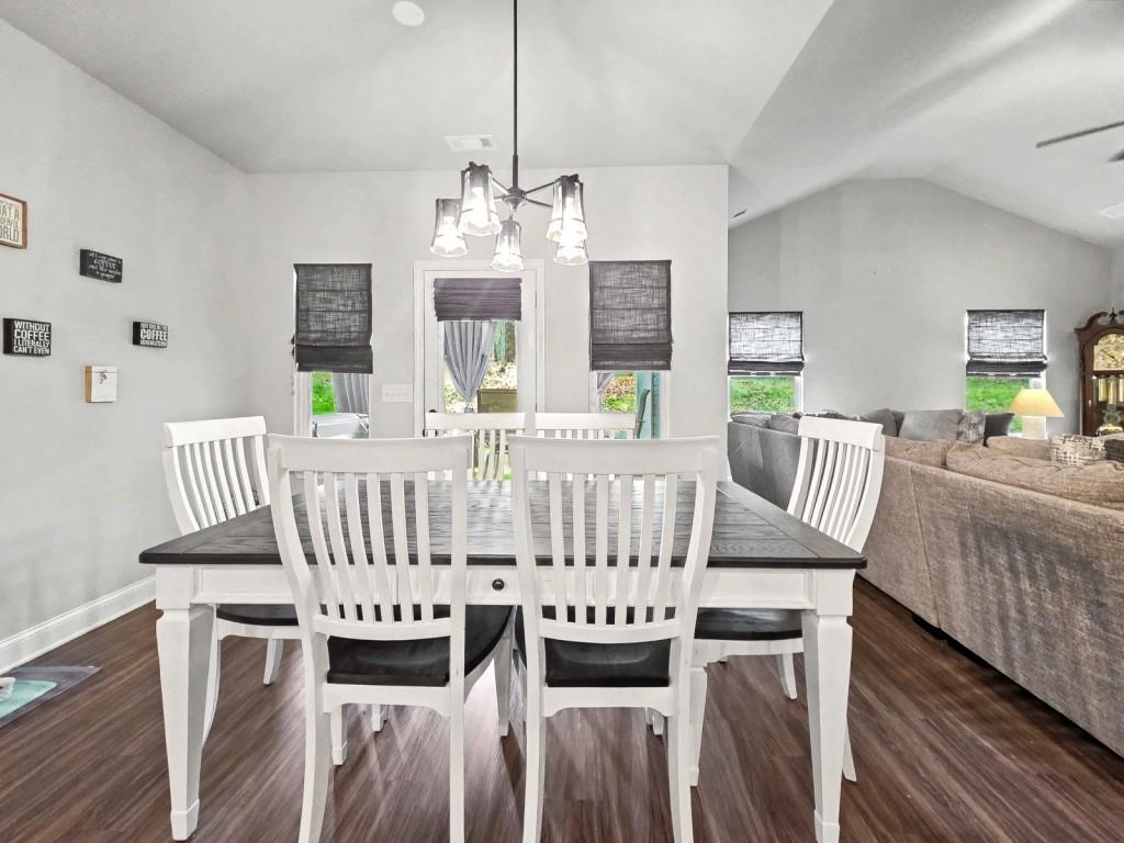 453 Mulberry Rock Road Temple, GA 30179 - Photo 8 of 35 a view of a dining room with furniture window and wooden floor