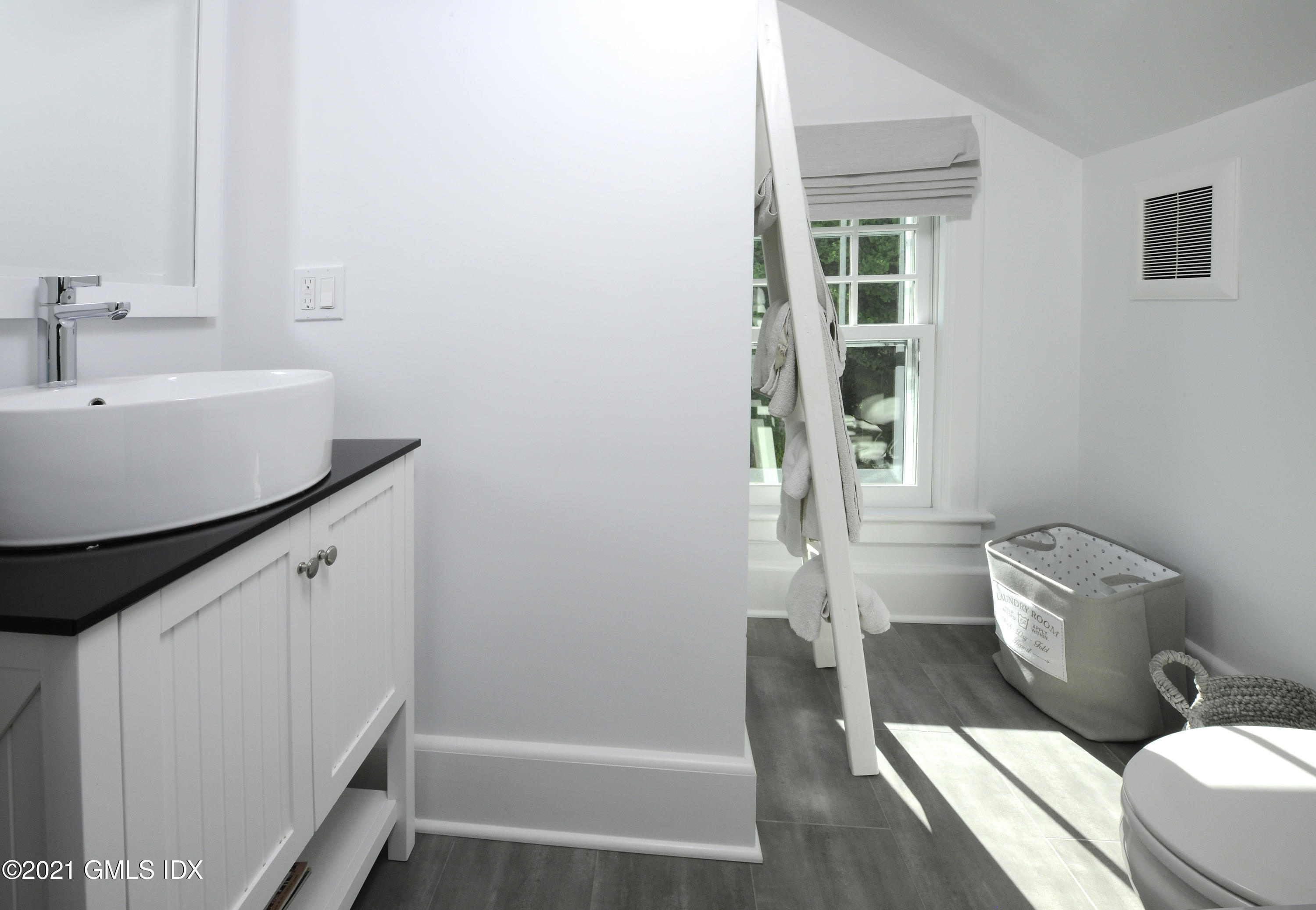 12 Binney Lane Old Greenwich, CT 06870 - Photo 17 of 28 a bathroom with a sink toilet and shower