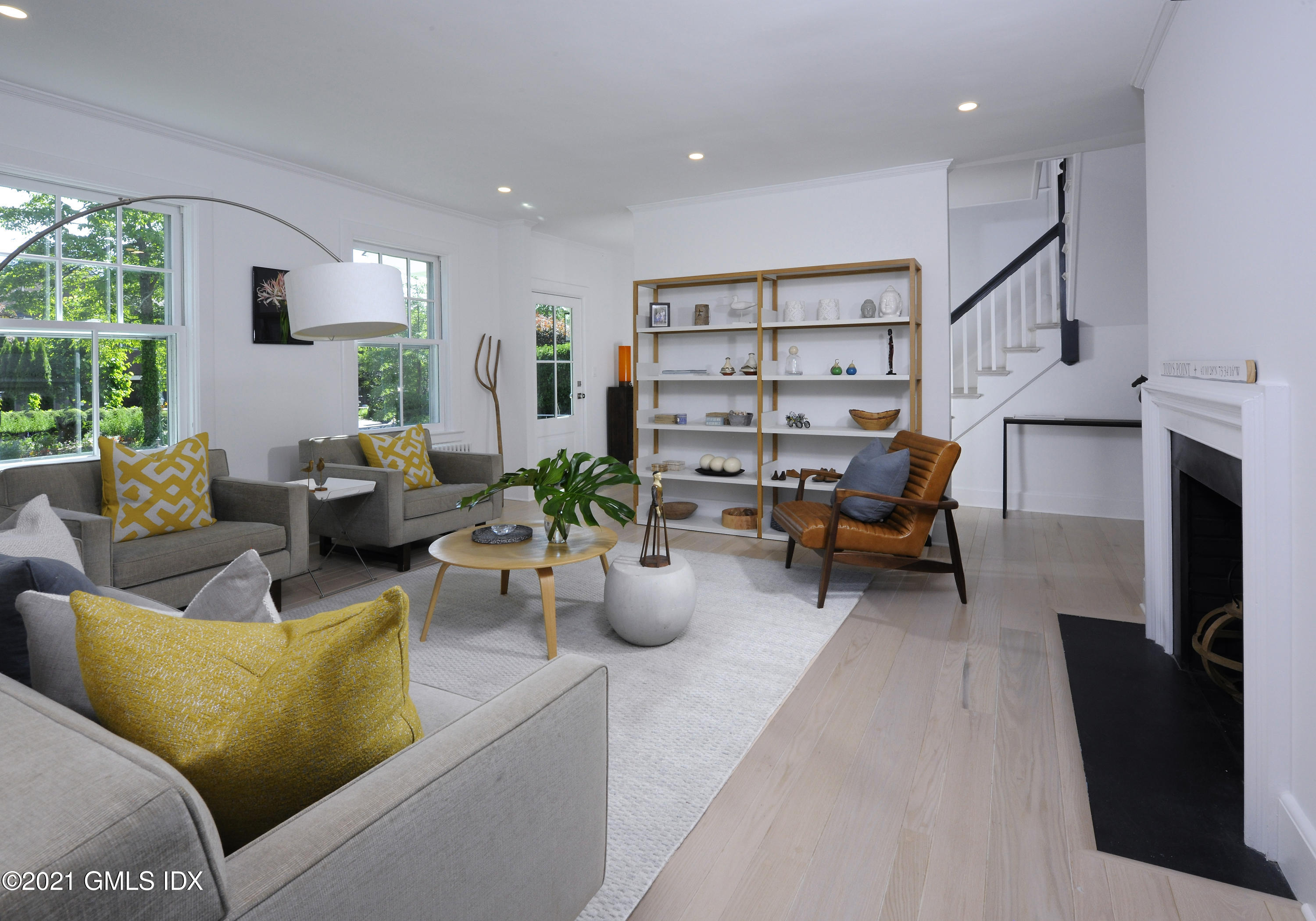 12 Binney Lane Old Greenwich, CT 06870 - Photo 5 of 28 a living room with furniture and a fireplace