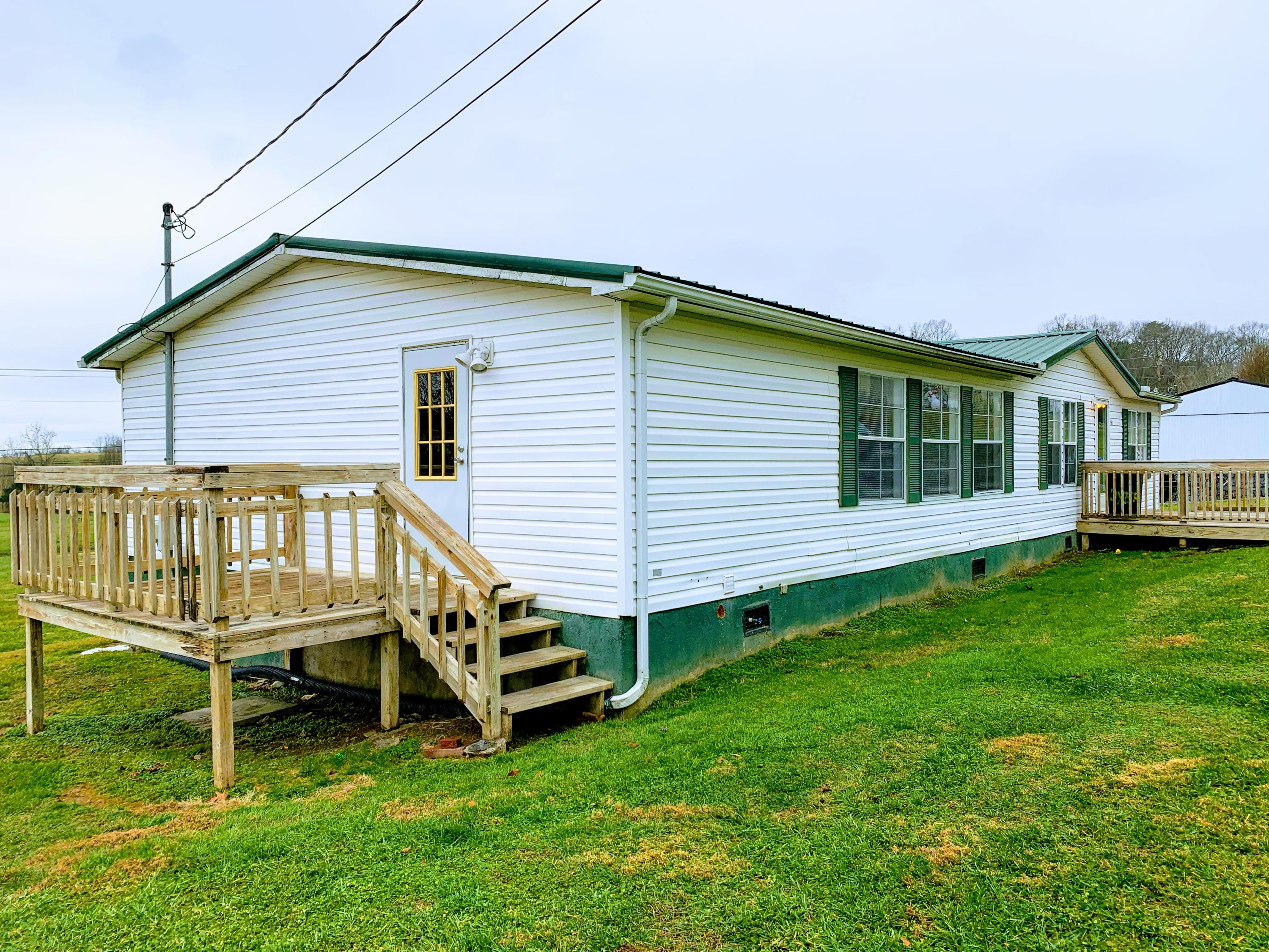 260 Quillen Shell Road Greeneville, TN 37745 - Photo 3 of 32 Side door