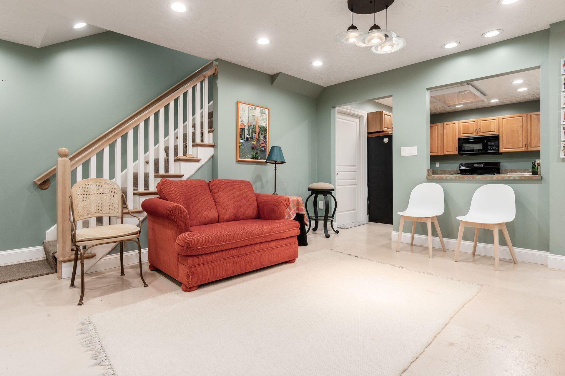 236 Tom Corwin Road Wellston, OH 45692 - Photo 44 of 104 SITTING AREA LEADING TO LL KITCHEN