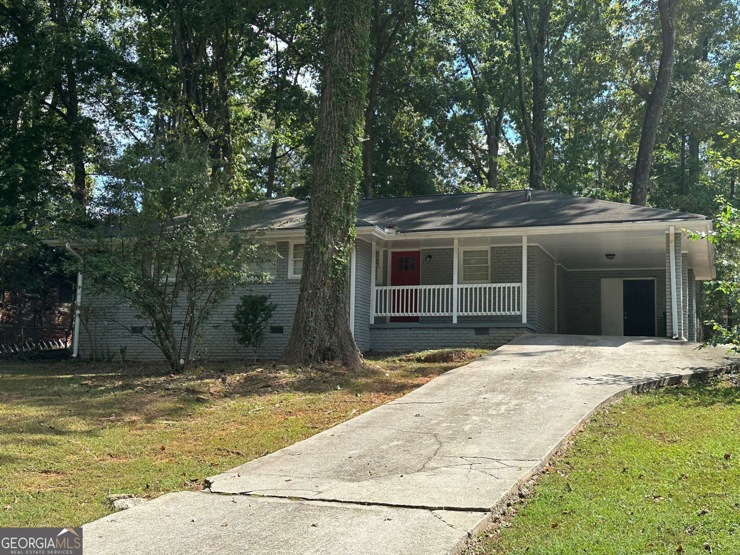 2360 Green Forrest Drive Decatur, GA 30032 - Photo 1 of 1 a house with trees in the background