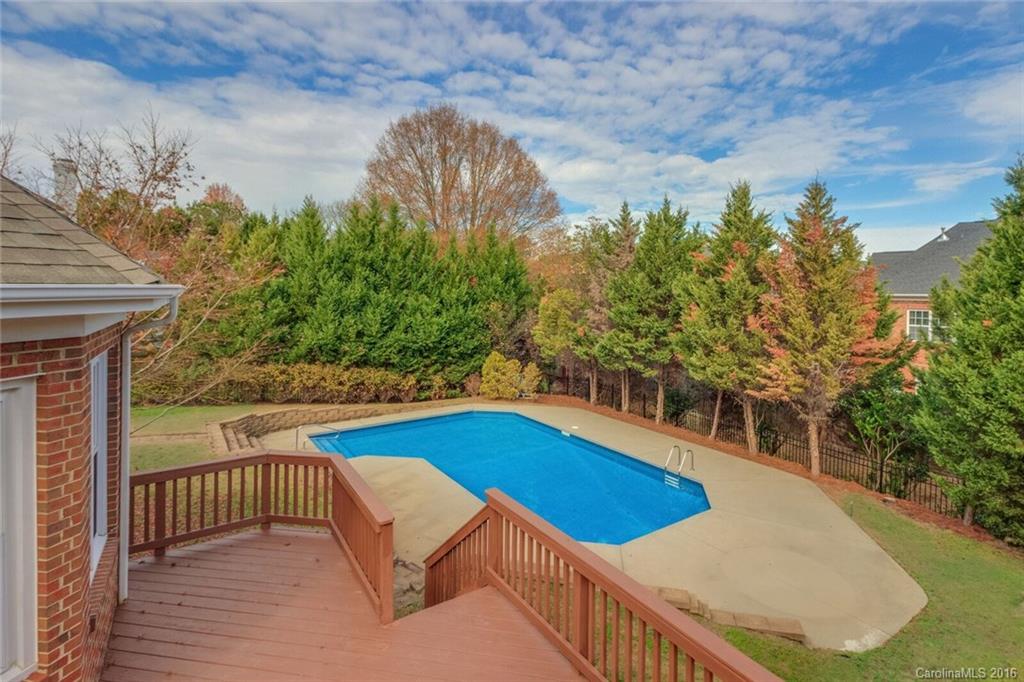 166 Lake Pointe Drive, Unit 122 Fort Mill, SC 29708 - Photo 8 of 22 a view of outdoor space and swimming pool