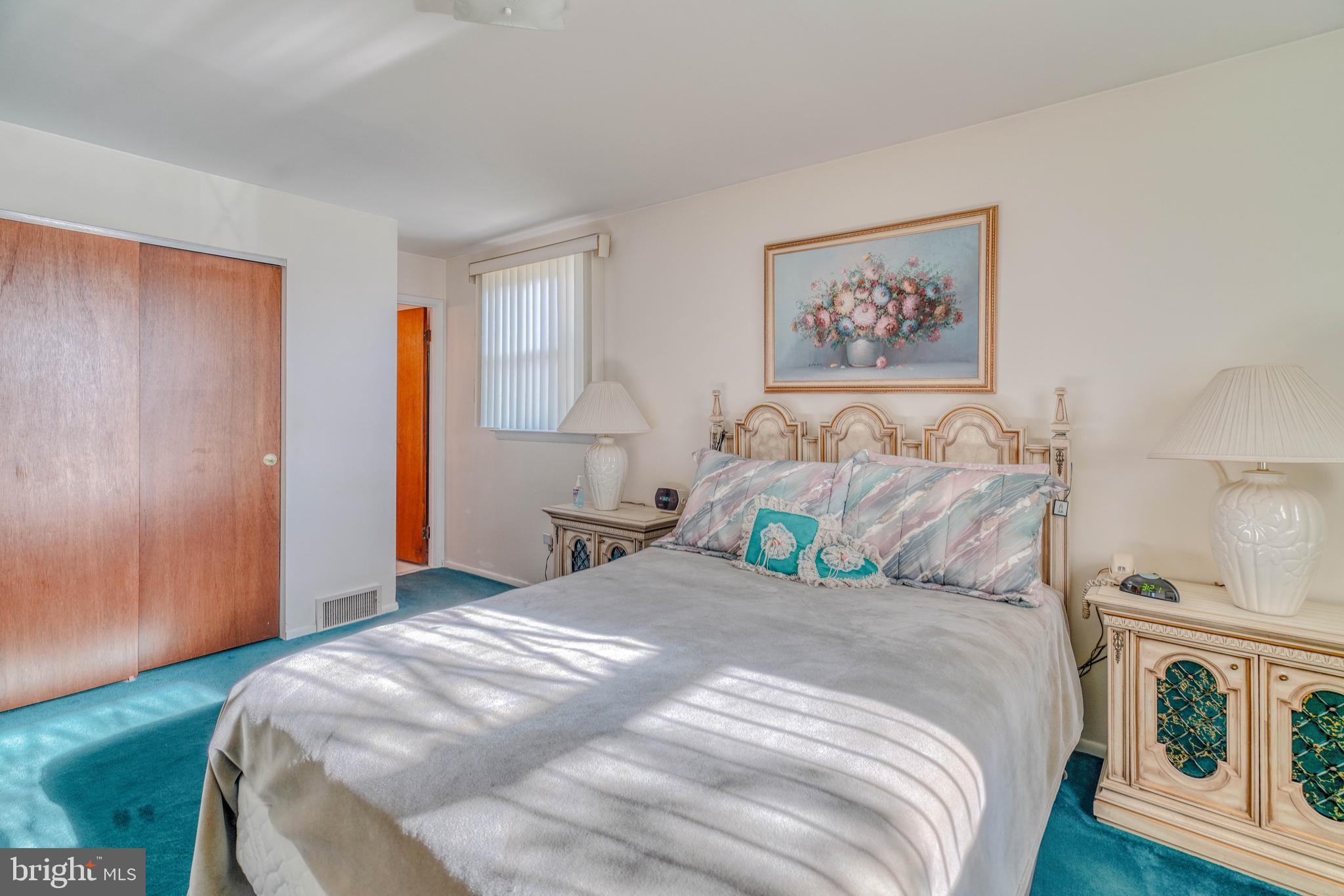 1137 Layton Road Philadelphia, PA 19115 - Photo 23 of 48 a bedroom with a bed and a view of bedroom