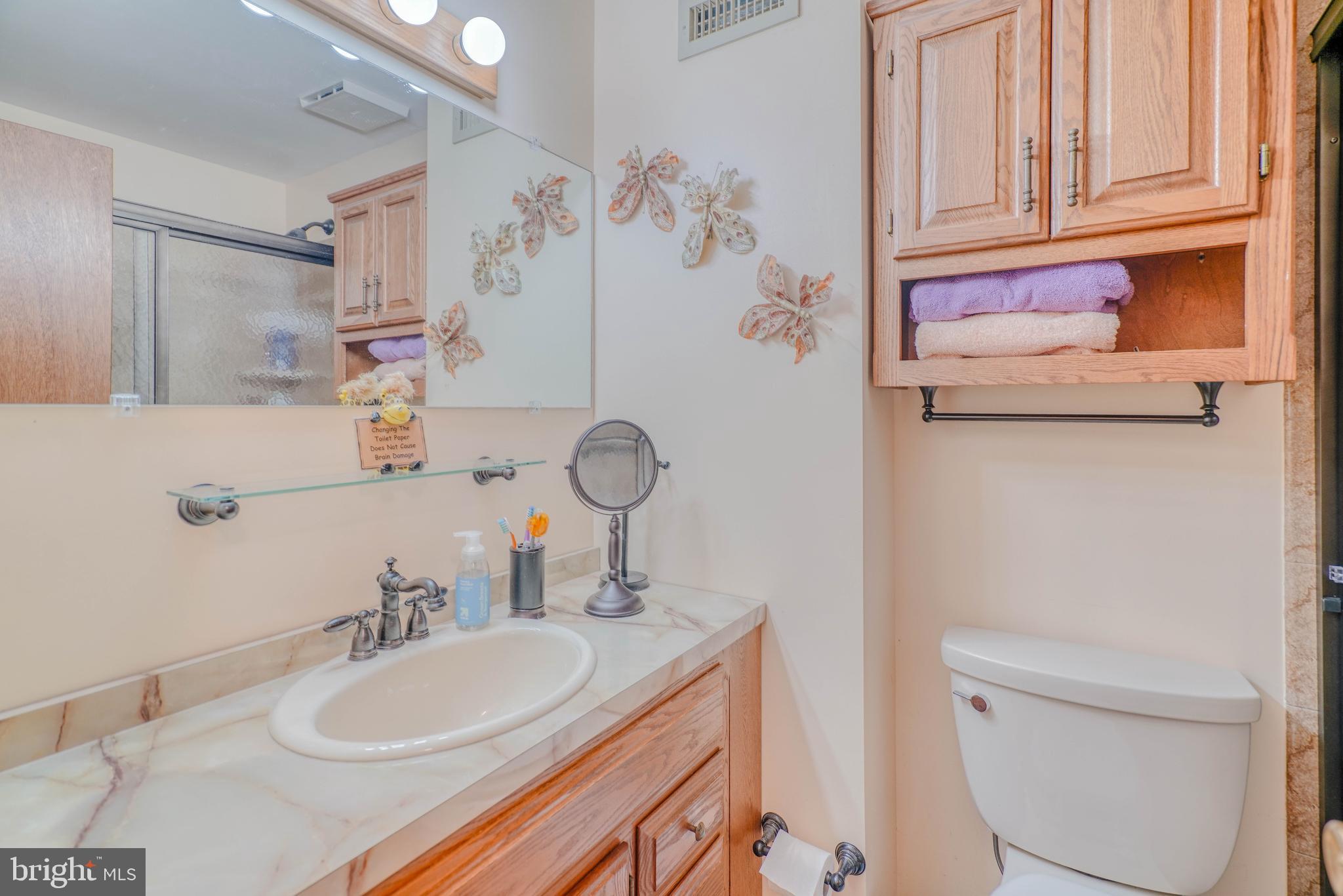 1137 Layton Road Philadelphia, PA 19115 - Photo 33 of 48 a bathroom with a sink toilet and shower