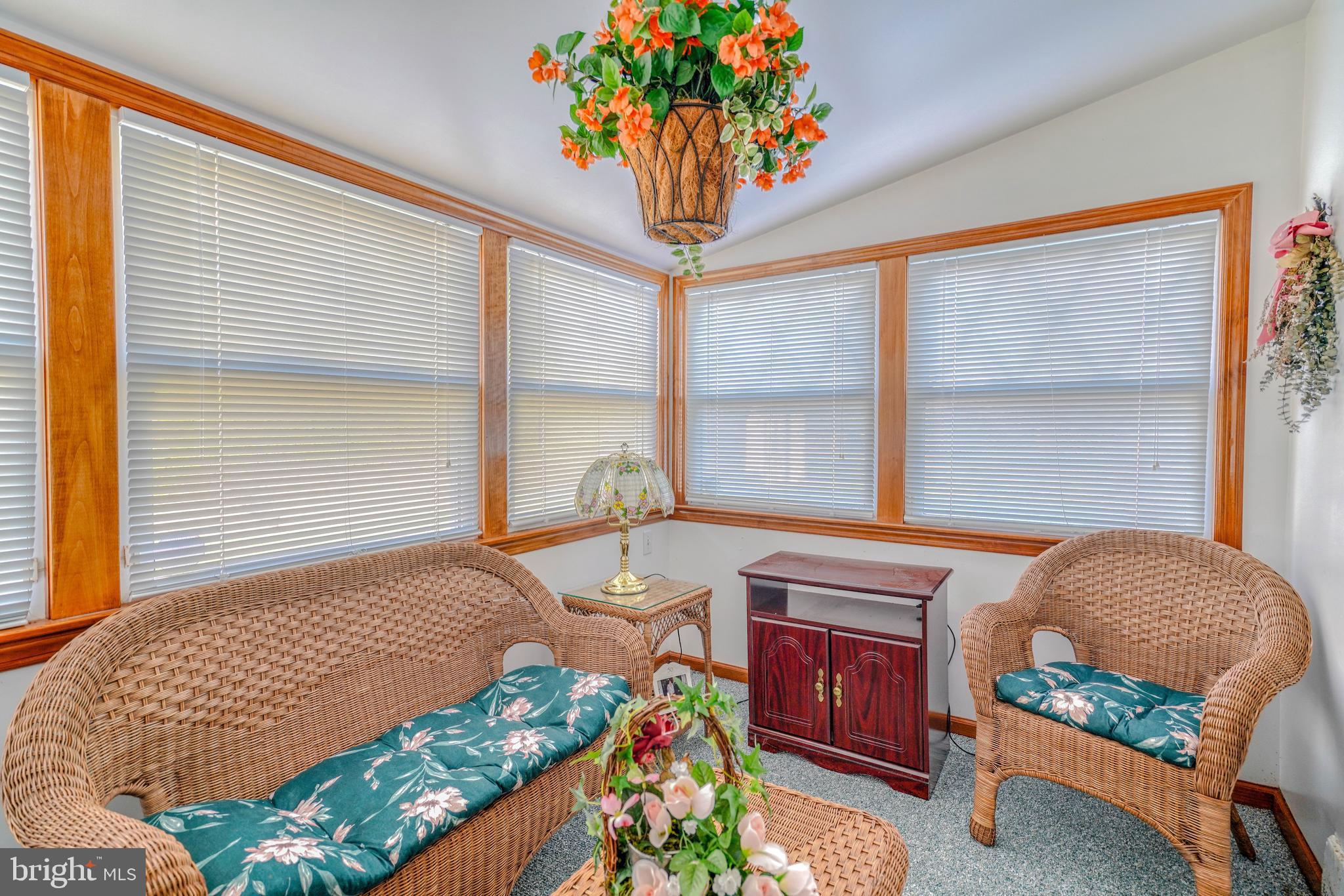 1137 Layton Road Philadelphia, PA 19115 - Photo 36 of 48 a bedroom with a bed and a chandelier
