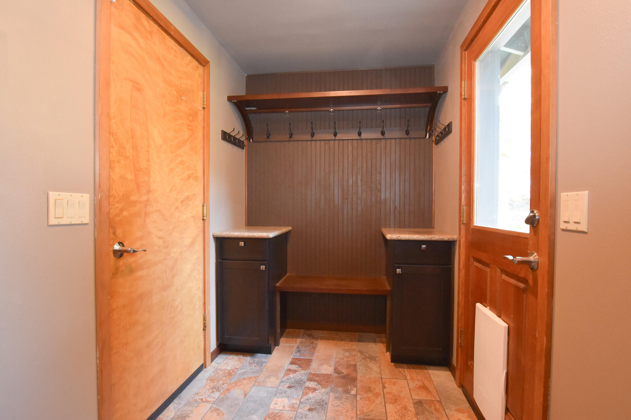 64730 Sylvan Loop Bend, OR 97701 - Photo 25 of 46 a bathroom with a glass shower door and a sink