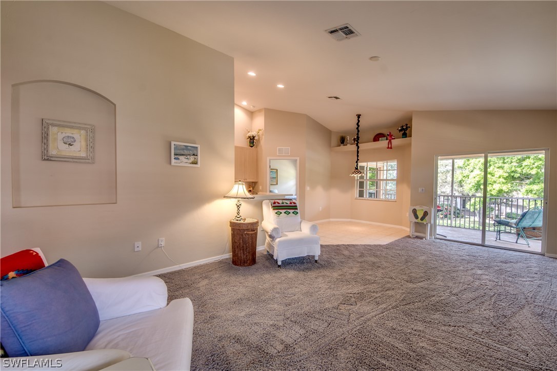 5180 Park Road, Unit 4 Fort Myers, FL 33908 - Photo 12 of 24 a living room with furniture and a large window