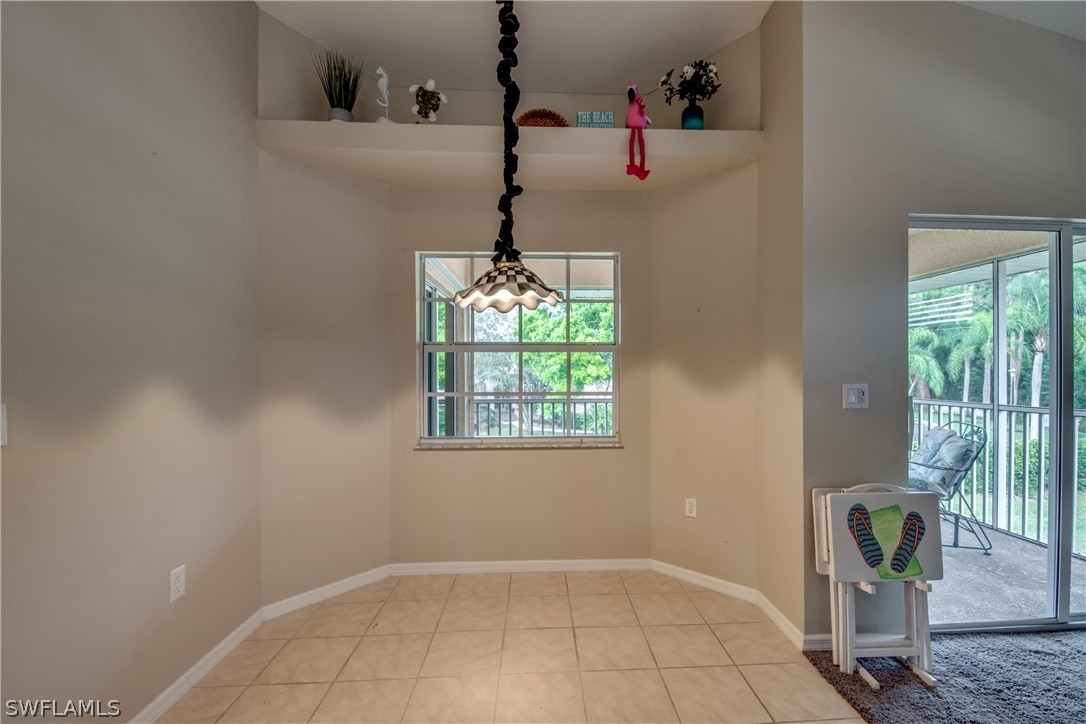 5180 Park Road, Unit 4 Fort Myers, FL 33908 - Photo 13 of 24 a view of entryway with window and wooden floor