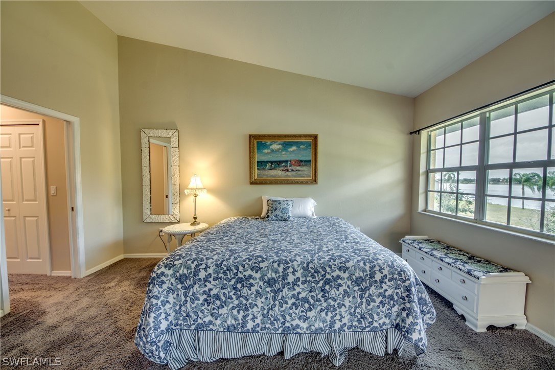 5180 Park Road, Unit 4 Fort Myers, FL 33908 - Photo 15 of 24 a bedroom with a bed and a window