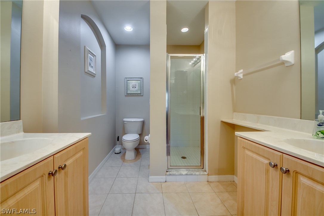 5180 Park Road, Unit 4 Fort Myers, FL 33908 - Photo 16 of 24 a bathroom with a sink a toilet and shower